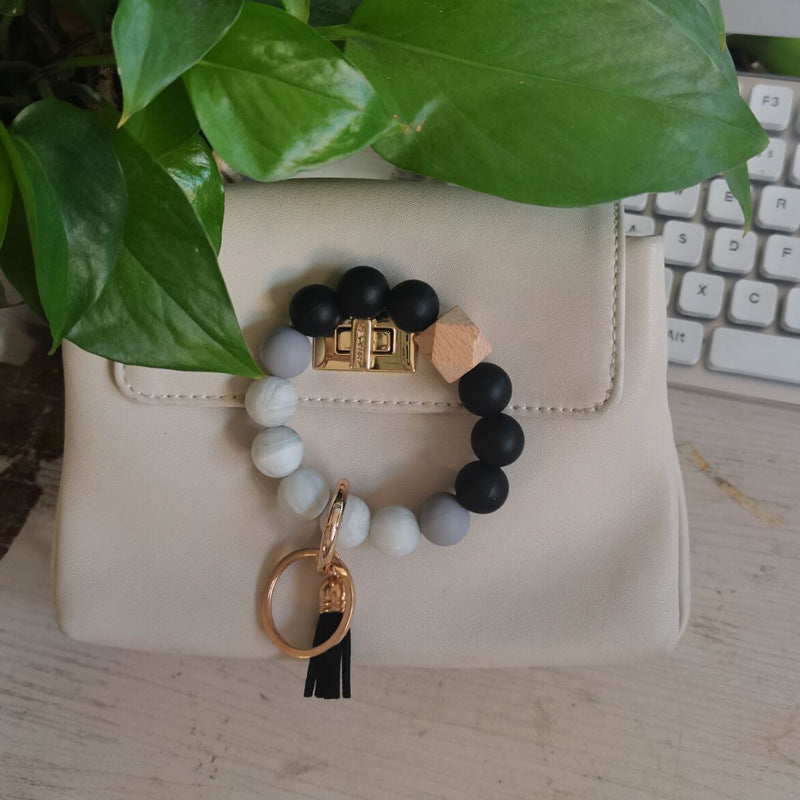 Llavero de muñeca con cuentas de silicona al por mayor